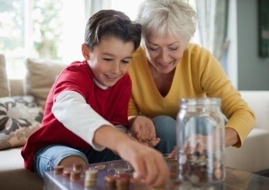 Grandma and Grandson Counting Coins